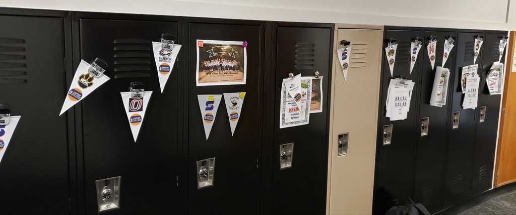 Seniors posted their college pennant on their locker.  