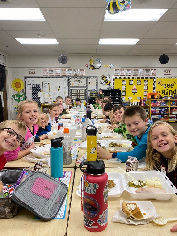 Thayer Central 3rd Grade eating Thanksgiving Dinner together! Sharing what they are thankful for.